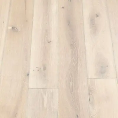 Alpine Plank Flooring: A close-up view of alpine-themed plank flooring, with light gray hues and a smooth finish, ideal for creating a serene and airy ambiance.