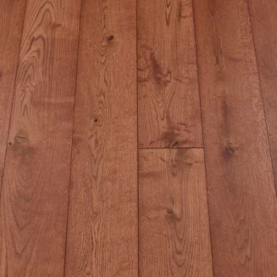 Carmine Plank Flooring: Jordan's Woodflooring carmine-coloured plank flooring, emphasizing its rich red tones and natural wood grain.