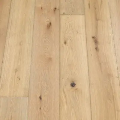 Dough Plank: A close-up of Jordan's Woodflooring in Dough, featuring warm, beige tones with a smooth texture that accentuates the natural wood grain.