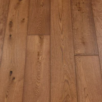 Mahogany Plank Flooring: A photograph of mahogany-themed plank flooring, featuring deep reddish-brown tones and a glossy finish, adding warmth and sophistication to interiors.