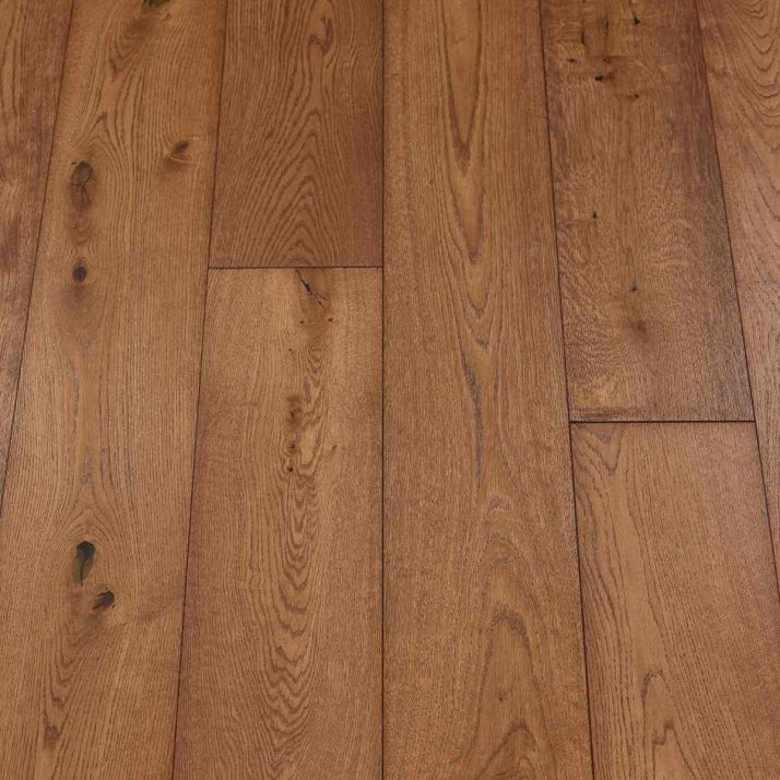 Main Resized Mahogany Woodflooring - image featuring Main Resized Mahogany wood flooring with a polished finish and a classic mahogany color, adding sophistication to any space.
