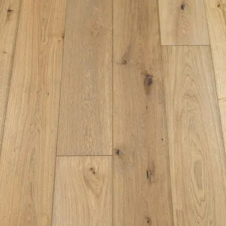 A plank wooden floor in a marine blue shade. The planks are sleek and narrow with a smooth surface and subtle colour variations, creating a unique and stylish look. This flooring is ideal for adding a pop of colour and character to a space while maintaining a natural wood feel.