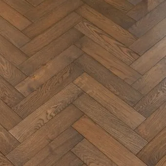Coffee Herringbone Flooring: A close-up view of coffee-coloured herringbone patterned flooring, displaying warm brown tones and a textured surface, creating a cozy atmosphere.