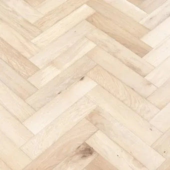 Ivory Herringbone Flooring: A close-up view of ivory-coloured herringbone patterned flooring, featuring a classic and elegant design suitable for various interior styles.