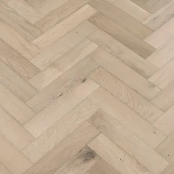 Resized Small Herring Shale: Shale-coloured small herringbone pattern flooring from Jordan Wood Floors, featuring a smooth and earthy grey tone.