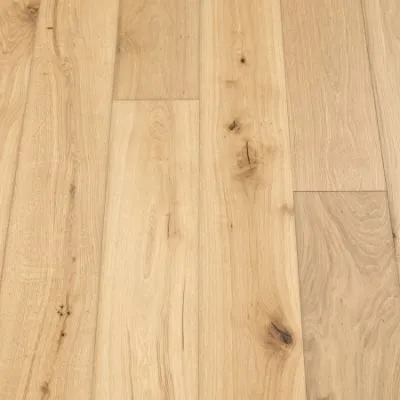 Satin Plank Flooring: A detailed photograph of satin-themed plank flooring, featuring soft gray tones and a smooth finish, adding elegance and versatility to interior designs.