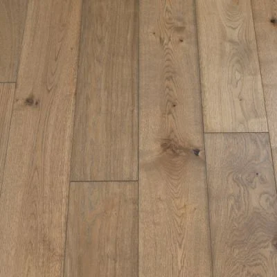 Slate Plank Flooring: A photograph displaying slate-inspired plank flooring, featuring dark gray tones and a textured surface, perfect for modern and industrial-themed interiors.