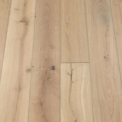 Titanium Plank Flooring: A close-up view of titanium-coloured plank flooring, displaying sleek metallic hues and a polished surface, perfect for modern and minimalist interiors.