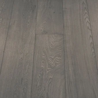 A wide plank flooring in a boulder finish, featuring neutral grey tones with a slightly textured surface. The wide boards and natural grain patterns give a bold yet understated look, ideal for modern interiors.