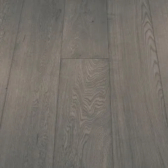 A wide plank flooring in a boulder finish, featuring neutral grey tones with a slightly textured surface. The wide boards and natural grain patterns give a bold yet understated look, ideal for modern interiors.