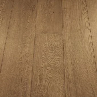 An image of Jordan Wood Floors’ Wide Chestnut plank, offering rich chestnut hues with pronounced wood grains, creating a warm and inviting ambiance for traditional or contemporary spaces.