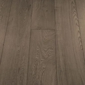 A product image of Wide Nordic plank flooring by Jordan Wood Floors, characterized by light, ashy tones with subtle wood grain details, ideal for a Scandinavian-inspired interior.