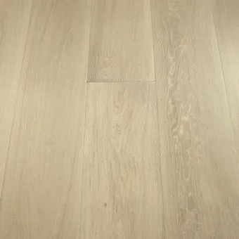 A wide plank flooring in a pebble finish, featuring neutral, grey-beige tones. The wide boards and natural wood grain create a balanced, understated look, perfect for blending into various interior styles.