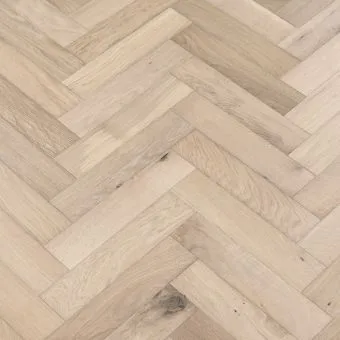 Coral Herringbone Flooring: A close-up view of coral-coloured herringbone patterned flooring, featuring warm pink tones reminiscent of ocean coral, adding a vibrant and cheerful touch to interior spaces.