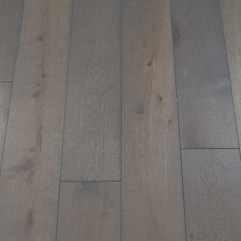 Classic Boulder Wood Flooring - image showcasing a boulder-gray wood flooring with a natural and neutral colour, adding a sense of calmness to the space.