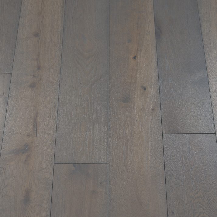 Classic Boulder Wood Flooring - image showcasing a boulder-gray wood flooring with a natural and neutral colour, adding a sense of calmness to the space.