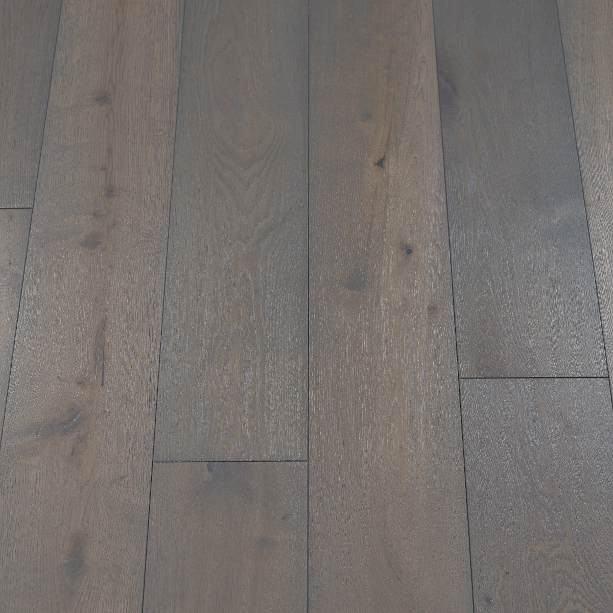Classic Boulder Wood Flooring - image showcasing a boulder-gray wood flooring with a natural and neutral colour, adding a sense of calmness to the space.
