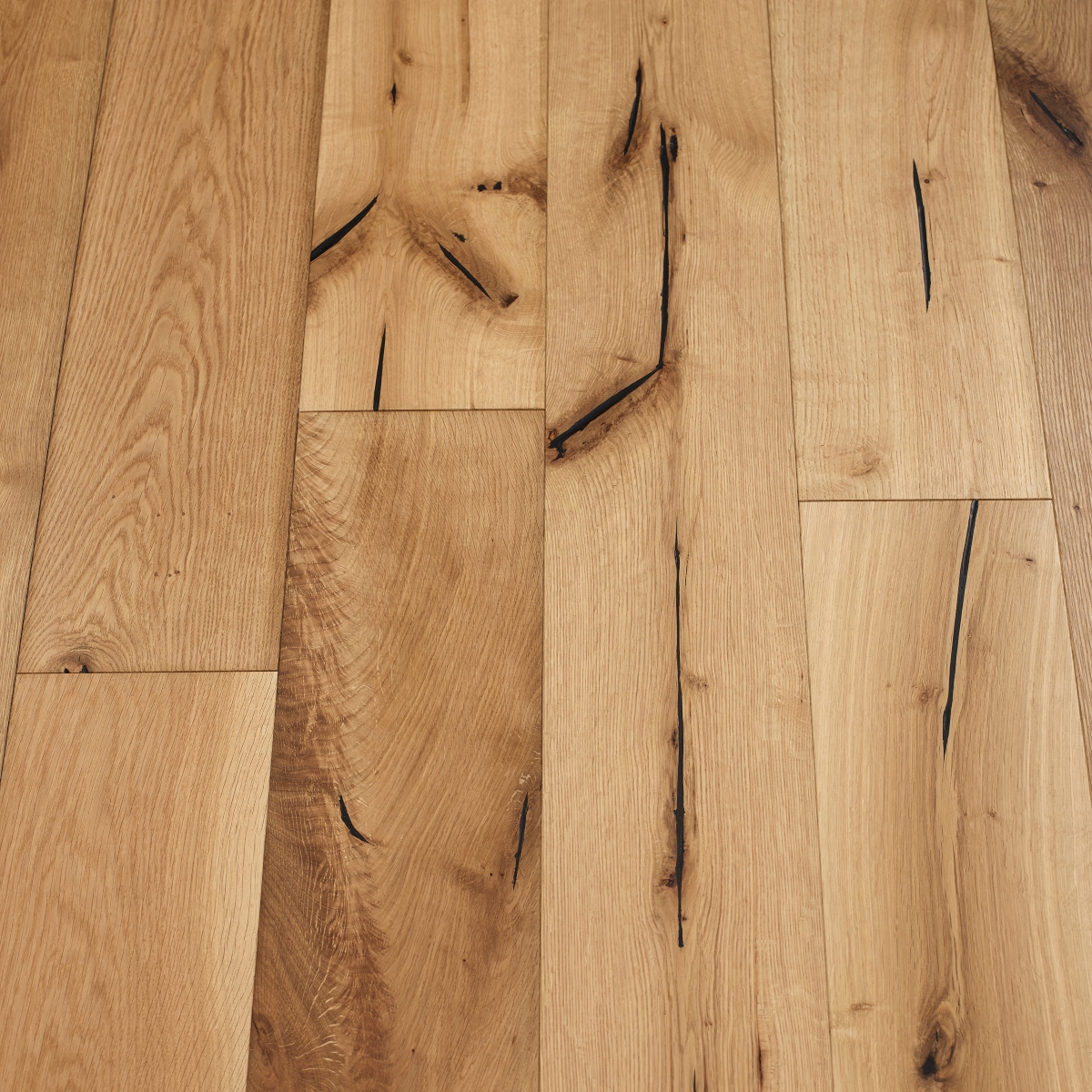 Distressed Natural Woodflooring - image showcasing distressed natural-colored wood flooring with a raw and untreated look, emphasizing the beauty of natural wood grains and textures.