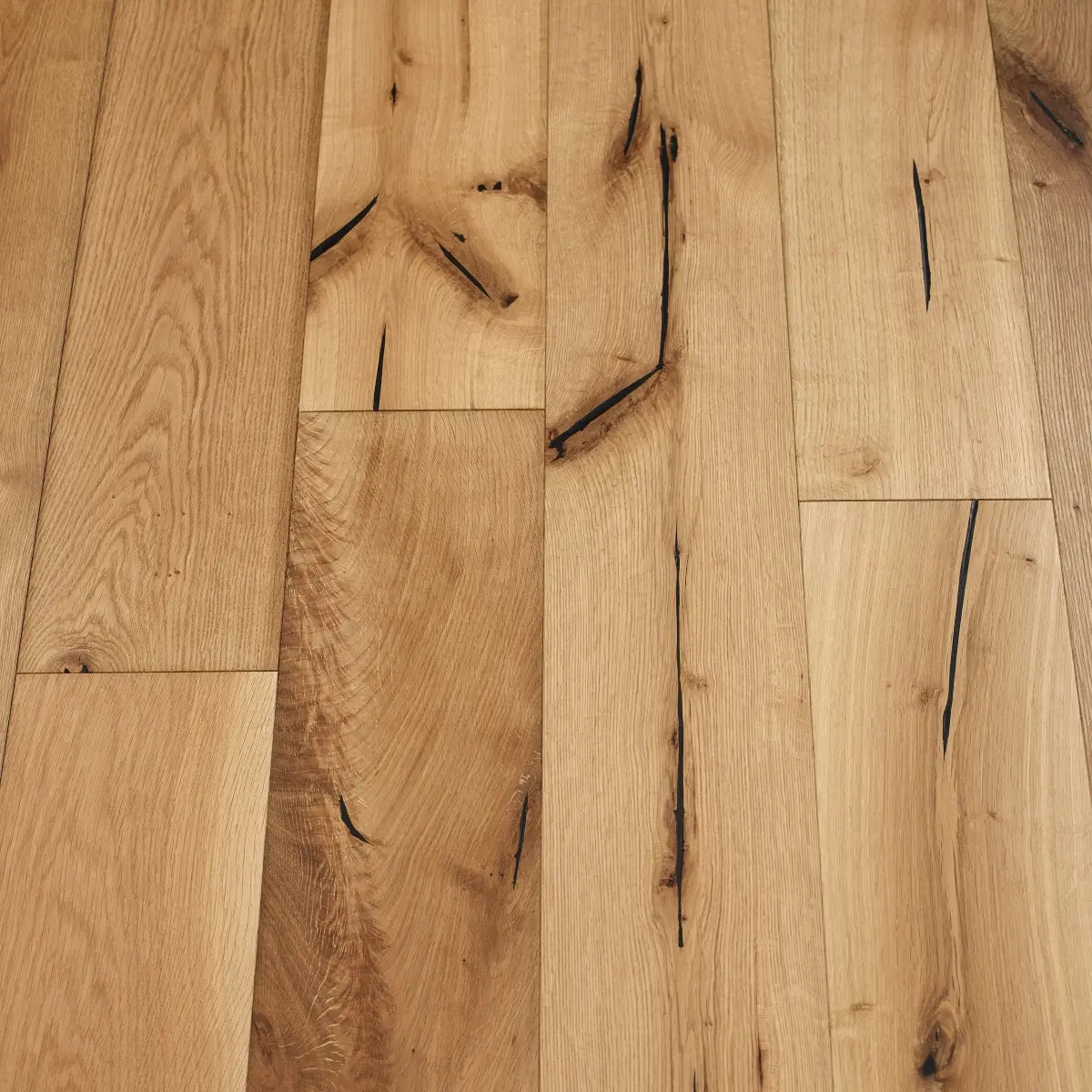 Distressed Natural Woodflooring - image showcasing distressed natural-colored wood flooring with a raw and untreated look, emphasizing the beauty of natural wood grains and textures.