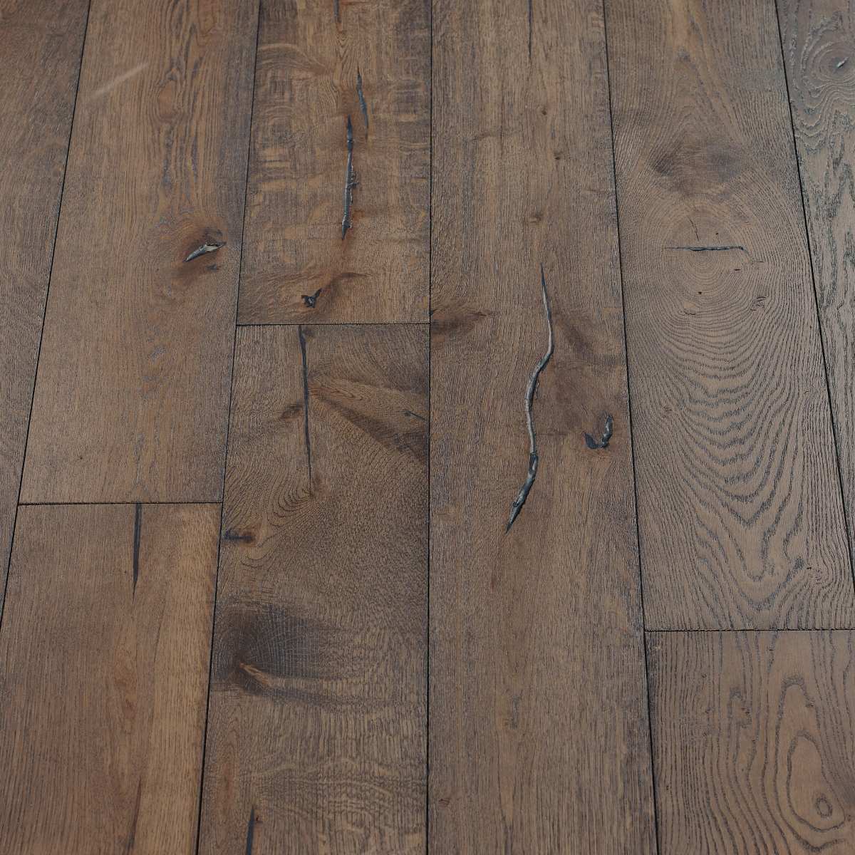 Distressed Nordic Woodflooring - image displaying distressed nordic-colored wood flooring with cool and muted tones, creating a modern and Scandinavian-inspired aesthetic.