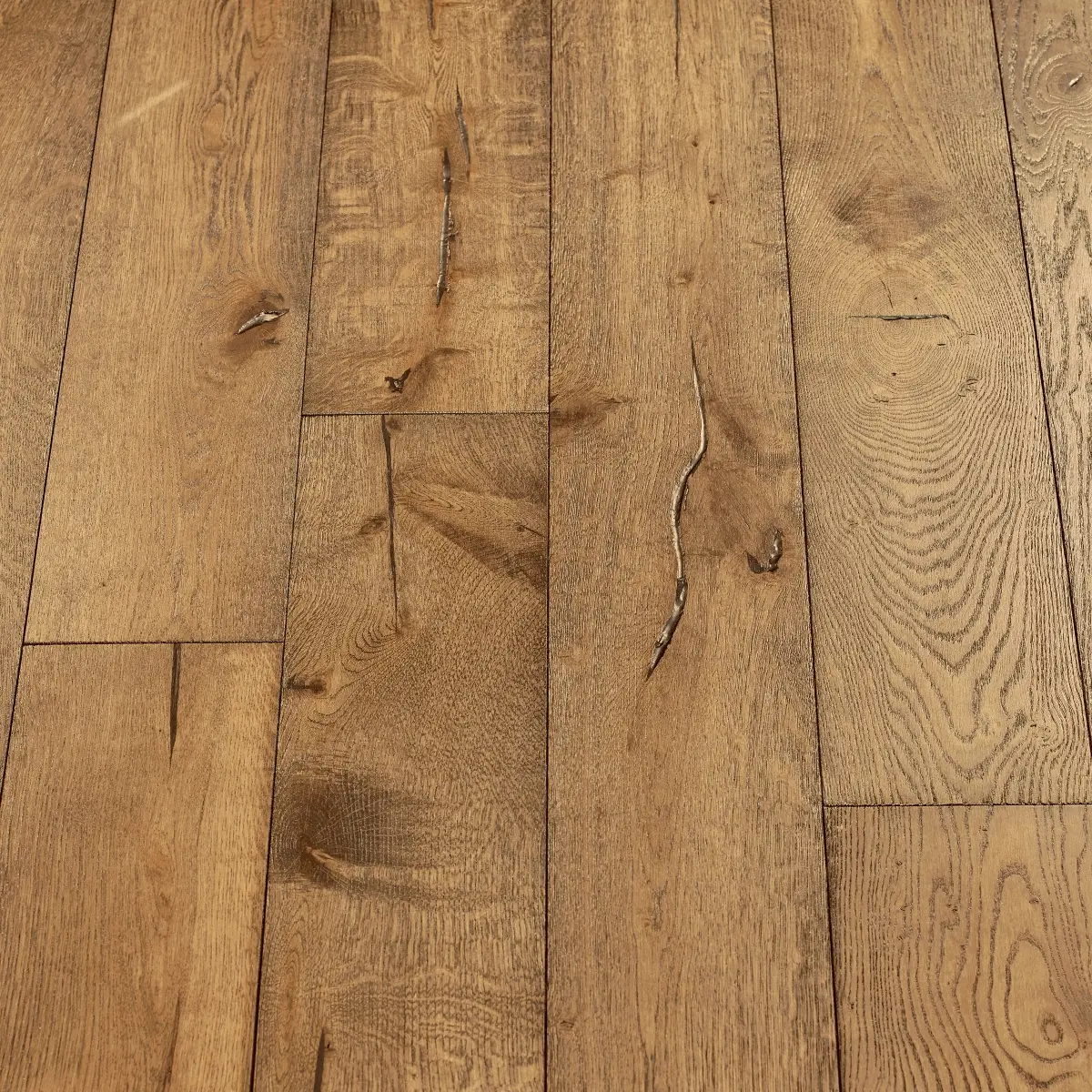 Distressed Pyrite Woodflooring - image showcasing distressed pyrite-colored wood flooring with metallic undertones, creating a unique and sophisticated look.