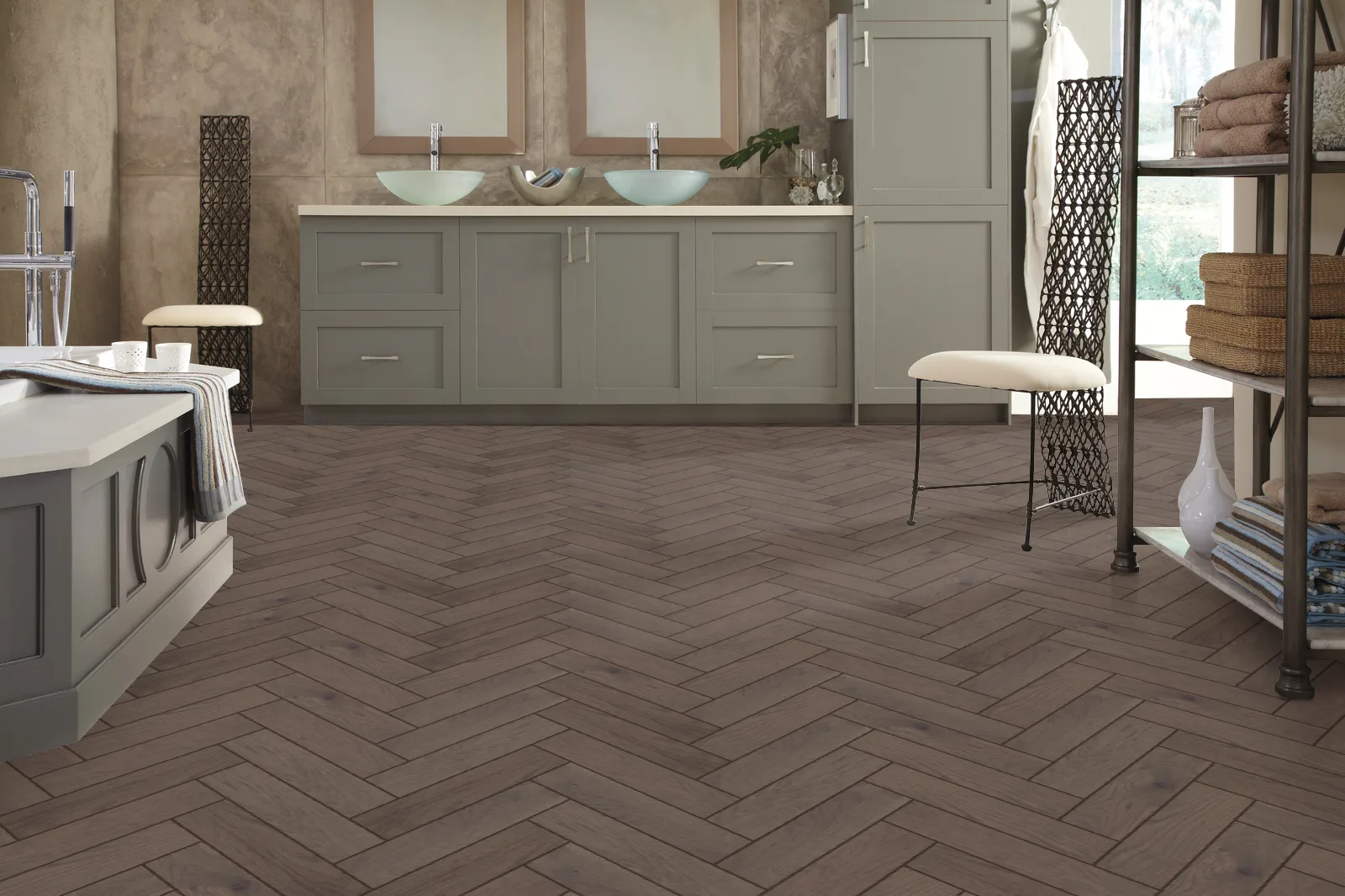 A simple, grayscale icon symbolizing grey herringbone flooring, potentially representing a product category or selection filter on Jordan Woodfloors’ website.