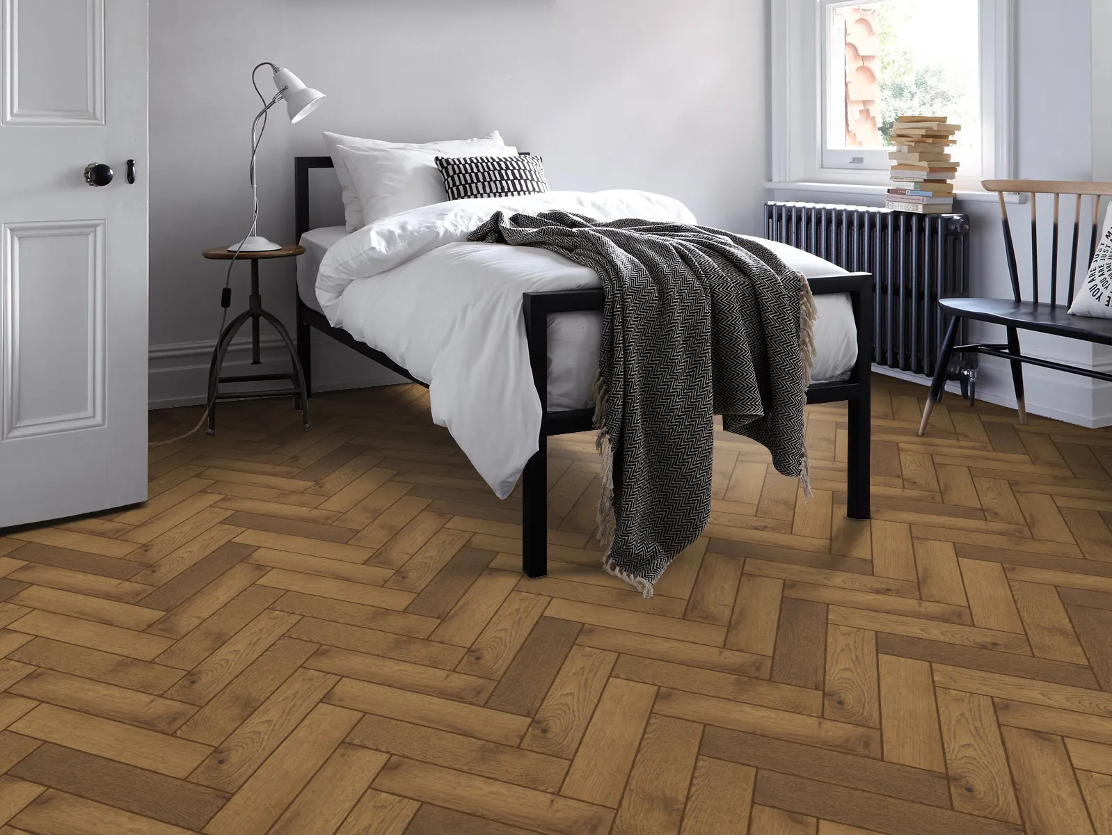 A graphical representation of light-stained herringbone flooring, likely used as an indicator for a product category featuring soft, natural wood tones.