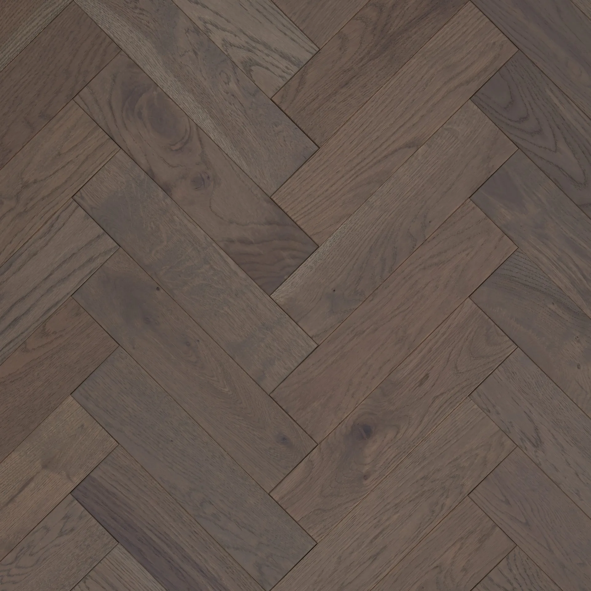 A high-resolution image of Jordan Woodfloors’ Light Grey herringbone flooring, featuring soft, neutral grey tones with subtle wood grain details, arranged in a herringbone pattern with a Brushed & UV Oiled finish for a smooth and elegant look.