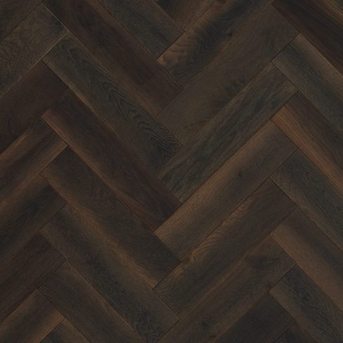 A high-resolution image of Jordan Woodfloors’ Scorched Oak herringbone flooring, featuring deep, charred brown tones with rich wood grain details and a Brushed & UV Oiled finish for a refined and durable appearance.